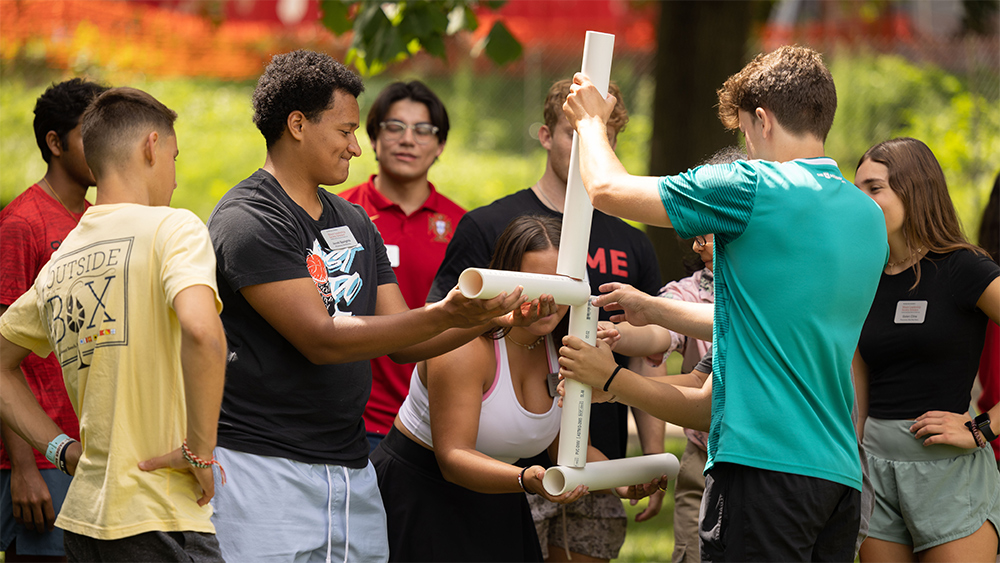 OSU Mount Scholars play team building games on the South oval during move-in week.